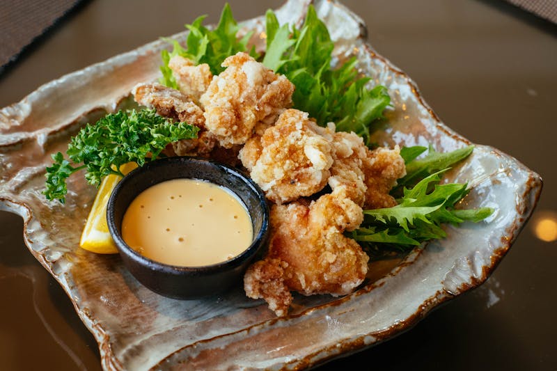 Crispy golden fried calamari served with dipping sauce